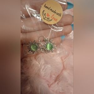 Green sun earrings